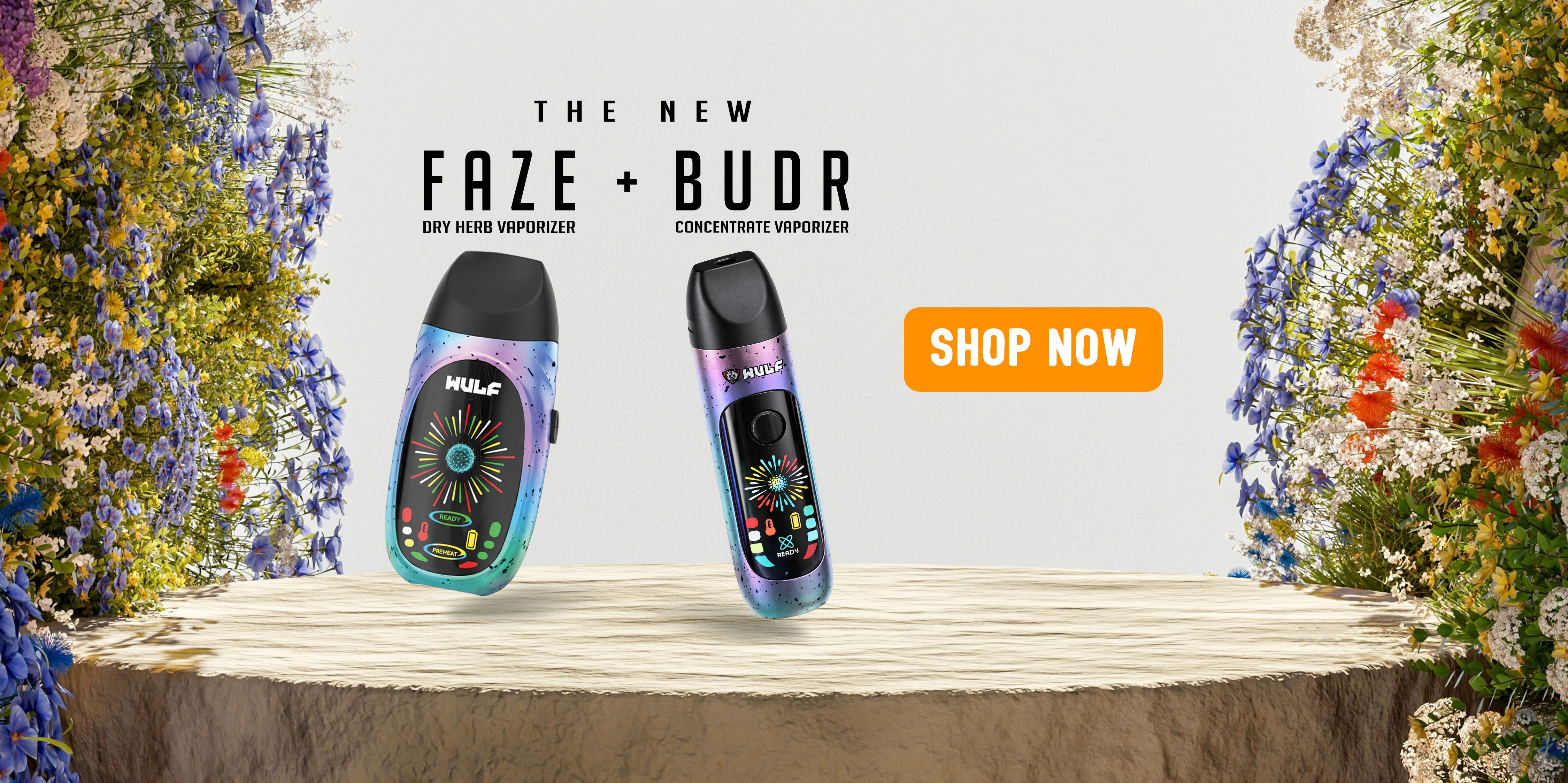 Wulf Faze and Wulf Budr vape devices on a wooden surface with flowers in the background and 'Shop Now' button.